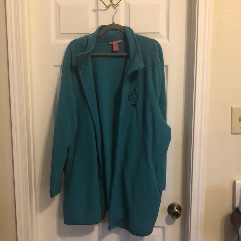Woman within teal polar fleece jacket with custom embroidery size 3x